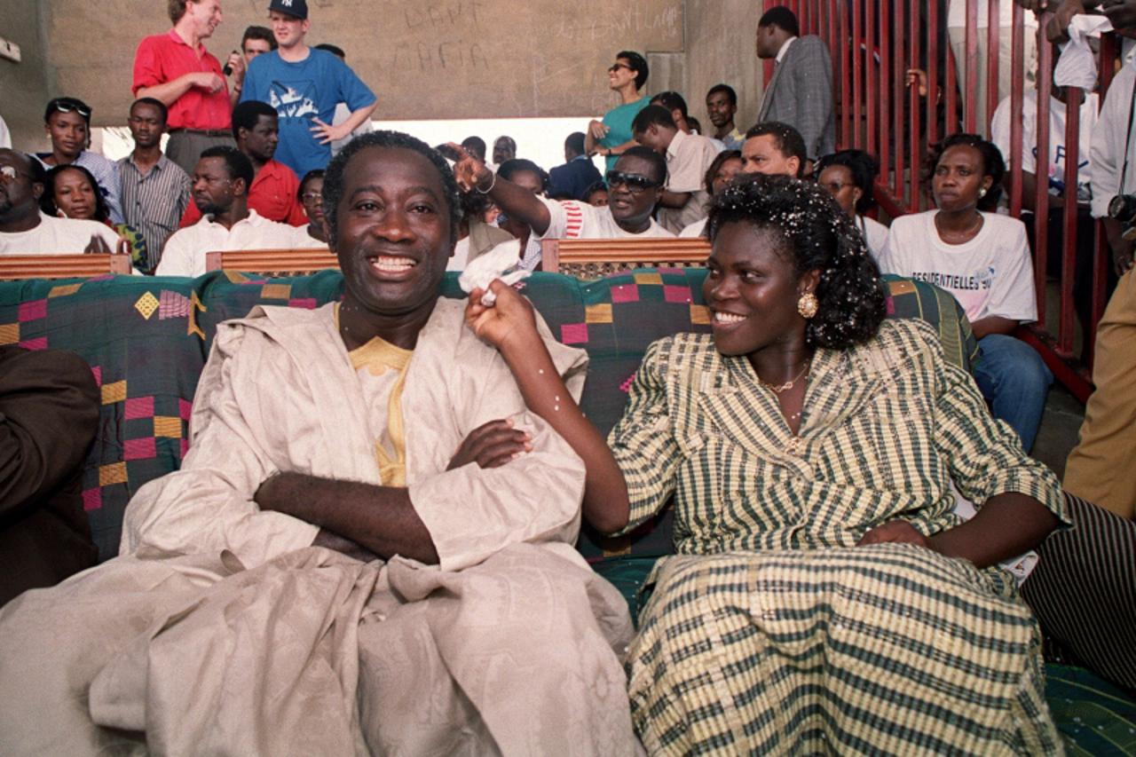 \'A picture taken on October 27 shows Laurent Gbagbo (L), leader of the Ivorian Popular Front, and his wife Simone Gbagbo in an Abidjan stadium during an election campaign. Ivory Coast strongman Laure