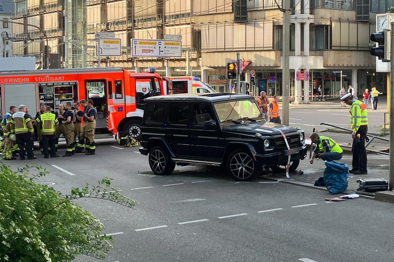 Car drives into group of people