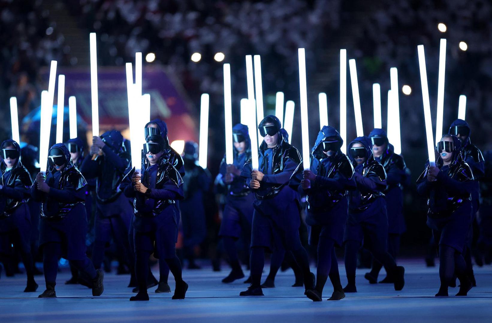 Soccer Football - FIFA World Cup Qatar 2022 - Group A - Qatar v Ecuador - Al Bayt Stadium, Al Khor, Qatar - November 20, 2022 General view of performers during the opening ceremony REUTERS/Kim Hong-Ji Photo: KIM HONG-JI/REUTERS