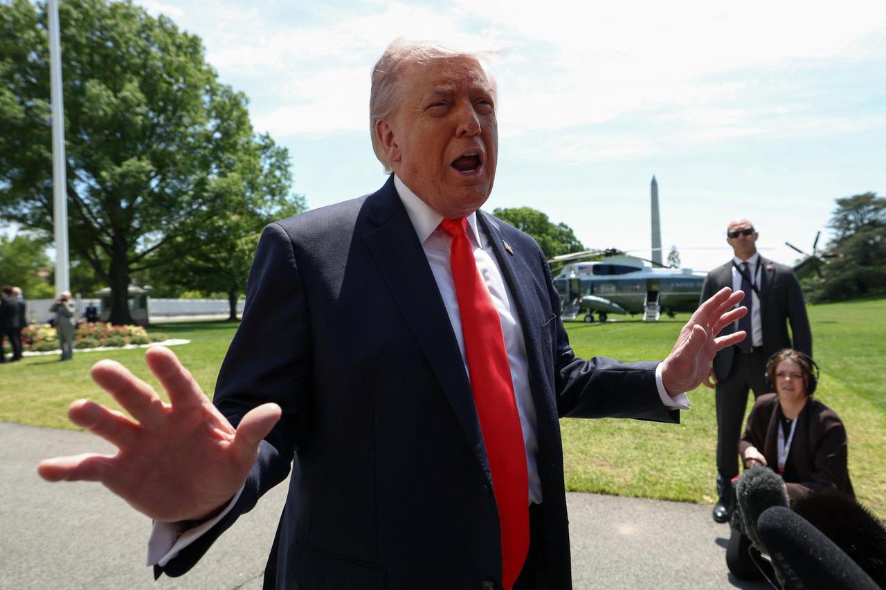 U.S. President Donald Trump departs the White House in Washington