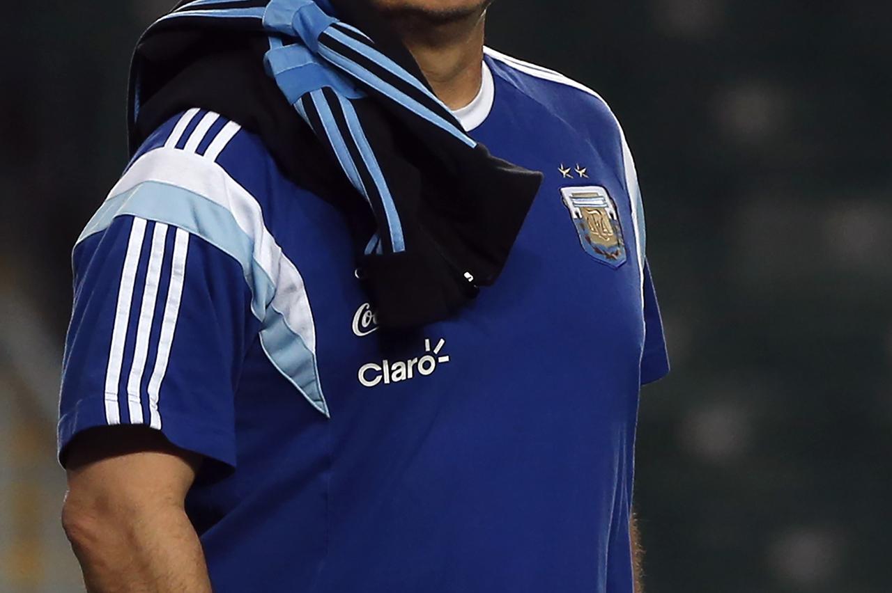 Argentina's national soccer team coach Gerardo Daniel Martino attends a training session ahead of their friendly soccer match in Hong Kong October 13, 2014. Argentina will be playing a friendly soccer match against Hong Kong on October 14, 2014. REUTERS/T
