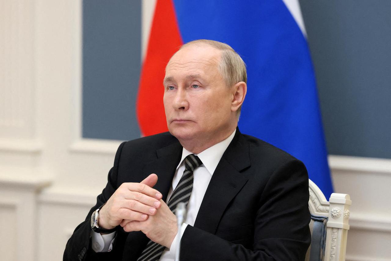 FILE PHOTO: Russian President Putin attends the Supreme Eurasian Economic Council via video link in Moscow