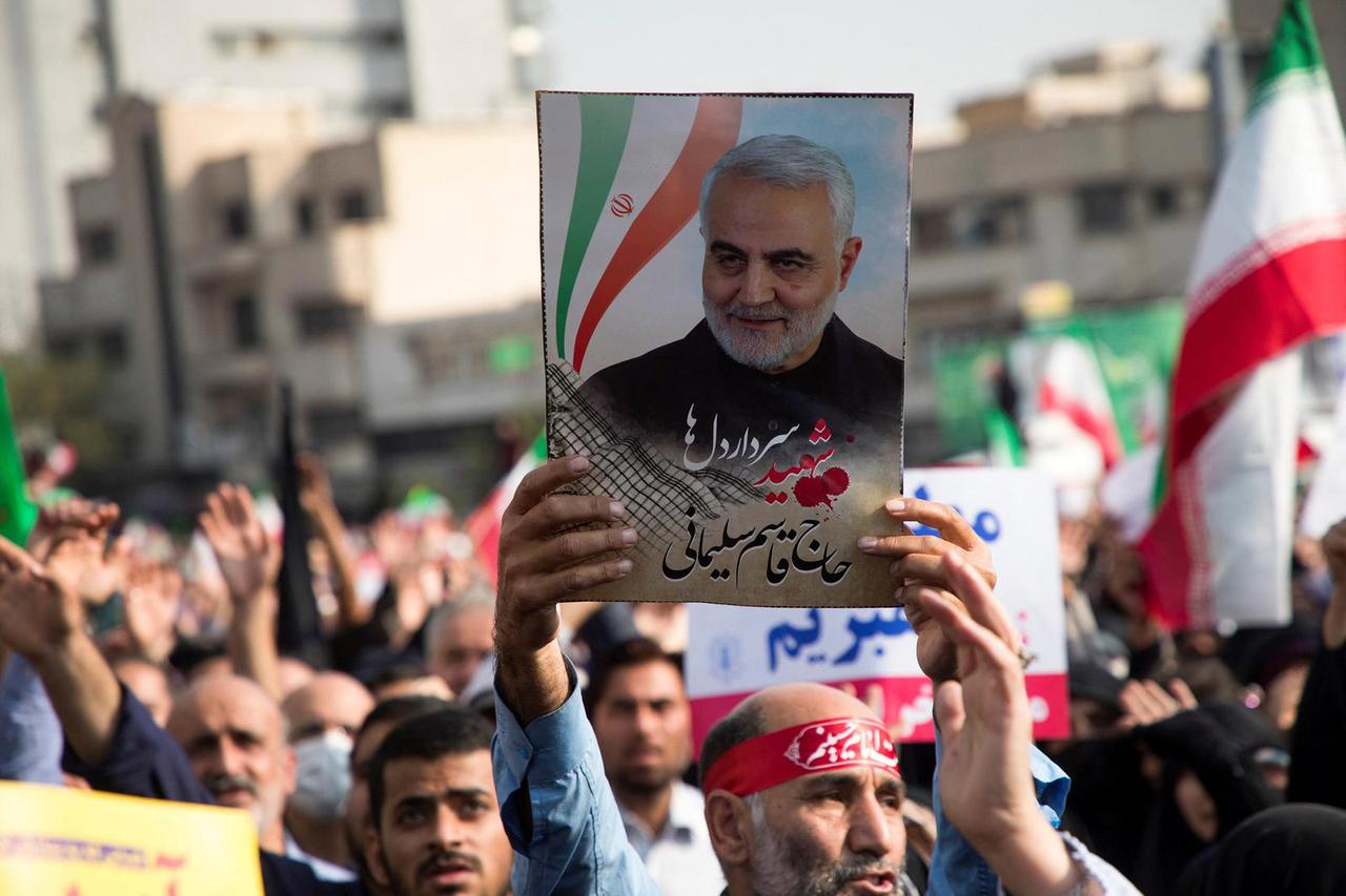 Iranians attend a protest condemning the Shiraz attack and unrest, in Tehran