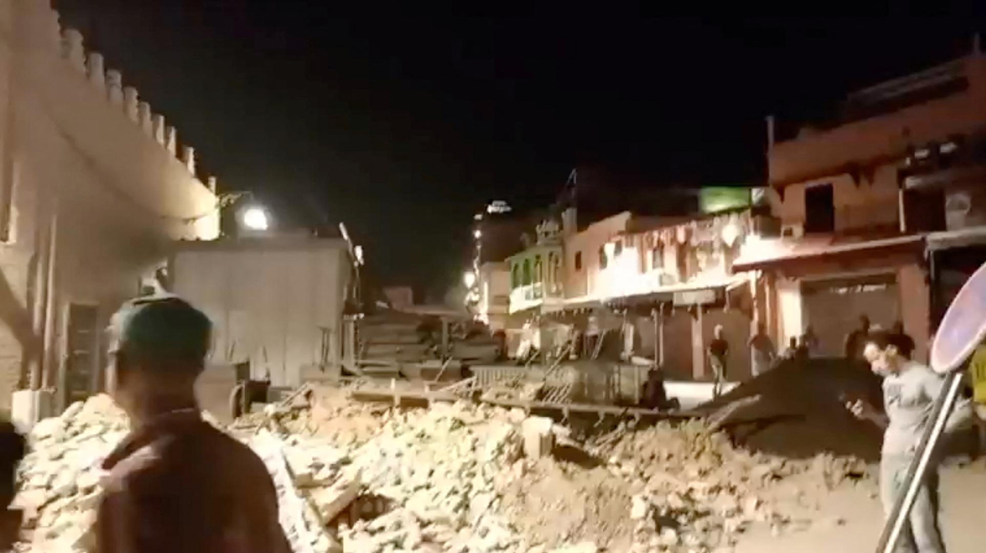 People look at debris in the aftermath of an earthquake in Marrakech, Morocco September 9, 2023 in this screen grab from a social media video in this picture. Al Maghribi Al Youm/via REUTERS  THIS IMAGE HAS BEEN SUPPLIED BY A THIRD PARTY. MANDATORY CREDIT. NO RESALES. NO ARCHIVES. Photo: AL MAGHRIBI AL YOUM/REUTERS
