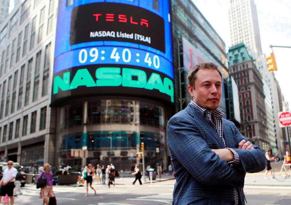 FILE PHOTO: CEO of Tesla Motors Elon Musk poses during a television interview after his company's initial public offering at the NASDAQ market in New York