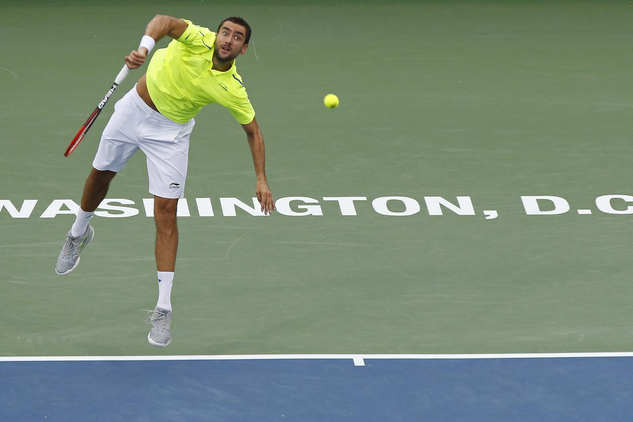 Aug 6, 2015; Washington, DC, USA; Marin Cilic serves against Sam Querrey (not pictured) on day four of the 2015 Citi Open at Rock Creek Park Tennis Center. Cilic won 7-6, 7-6. Mandatory Credit: Geoff Burke-USA TODAY Sports