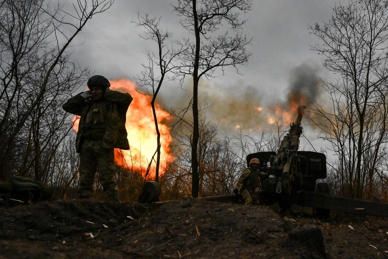 Ukrainian servicemen fire shell from 2A65 Msta-B howitzer towards Russian troops in a frontline in Zaporizhzhia region