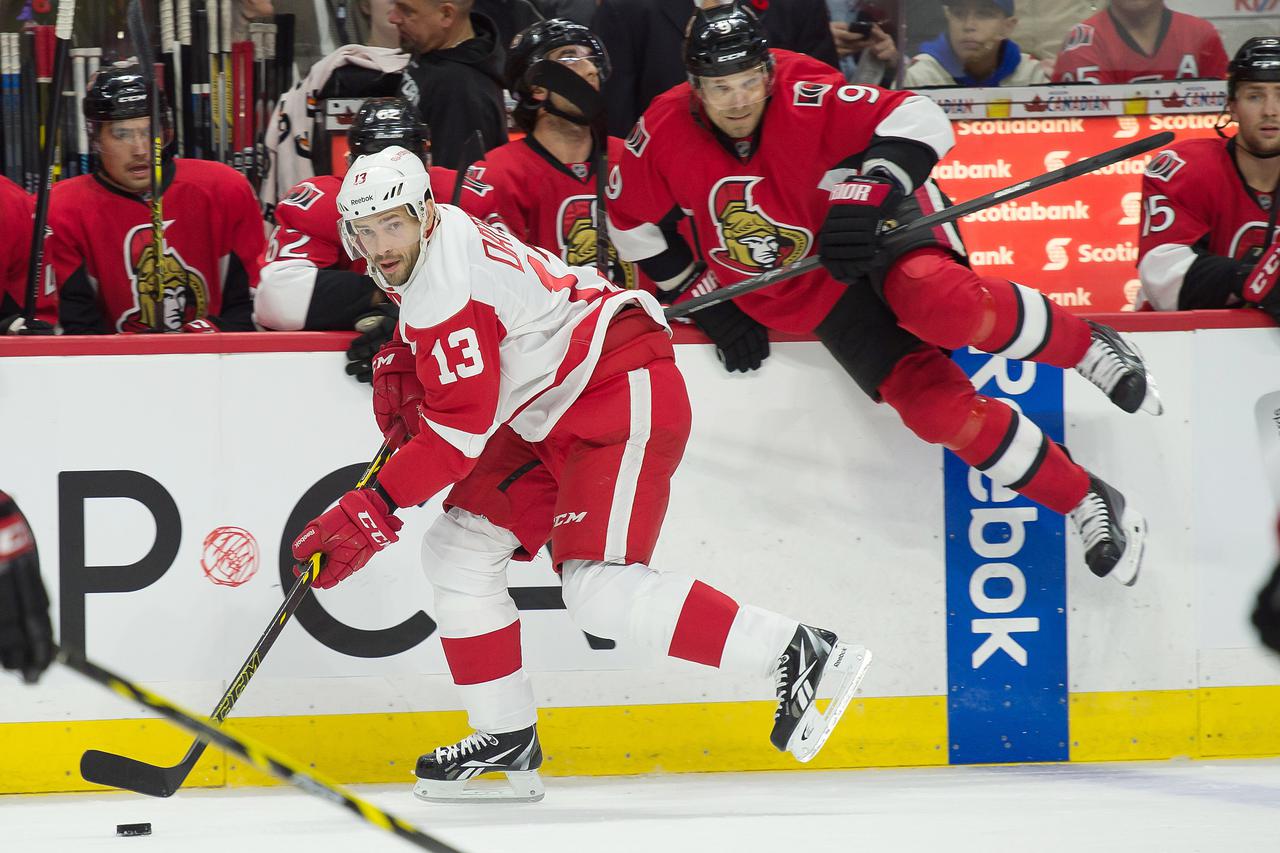Nov 4, 2014; Ottawa, Ontario, CAN; Detroit Red Wings center Pavel Datsyuk (13) skates with the puck in the first period against the Ottawa Senators at the Canadian Tire Centre. Mandatory Credit: Marc DesRosiers-USA TODAY Sports  / Reuters Picture Supplied