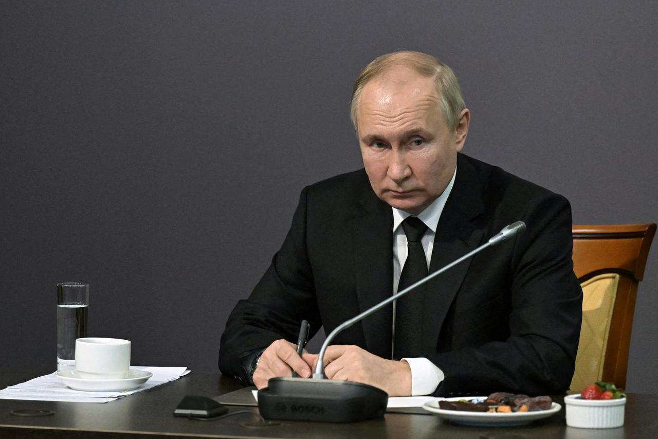 FILE PHOTO: Russia's President Putin takes part in events commemorating the anniversary of breaking the siege of Leningrad