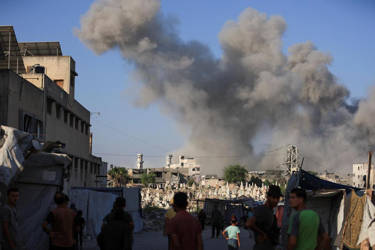 Smoke rises following an explosion during an Israeli operation, in Gaza City