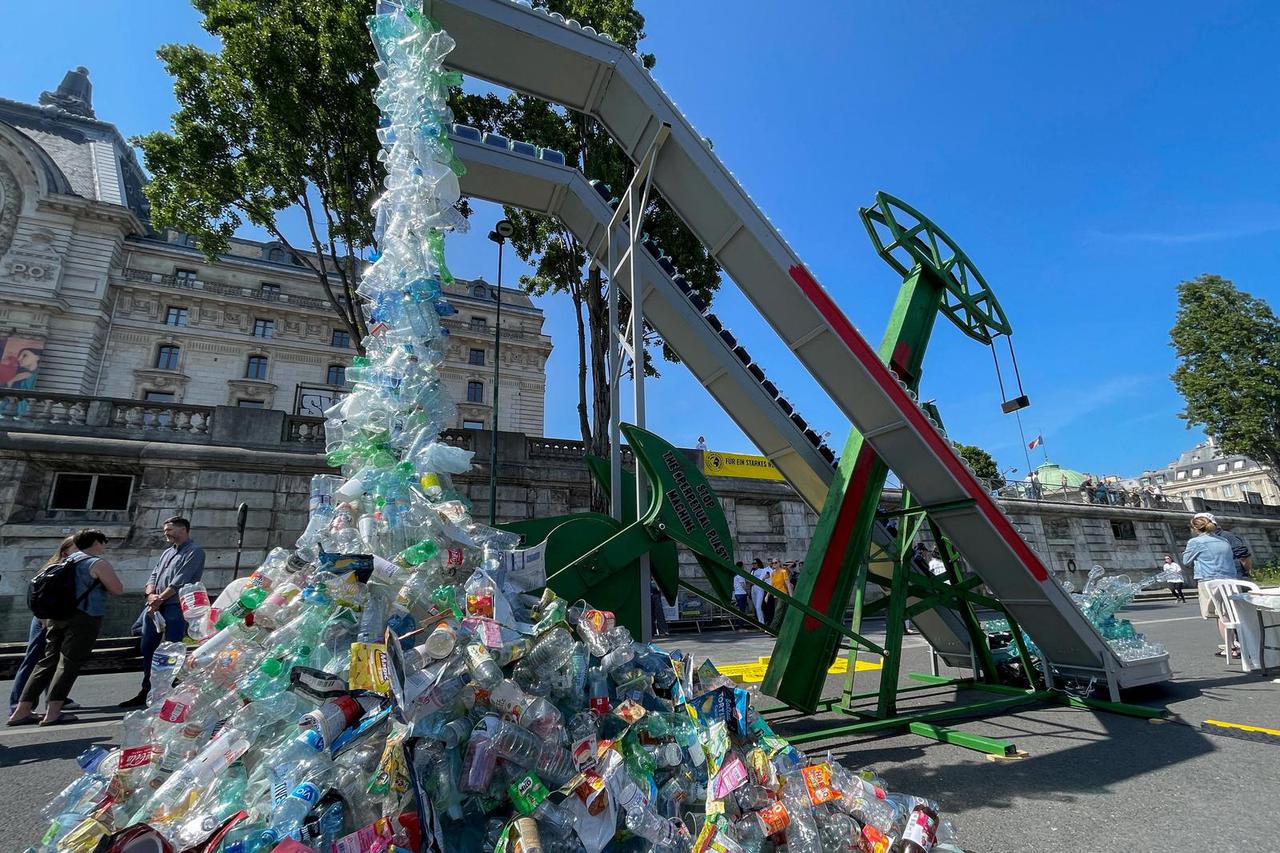FILE PHOTO: Greenpeace International unveils an art installation by artist Benjamin Von Wong, ahead of a United Nations Environment Programme summit on reducing plastic pollution, in Paris
