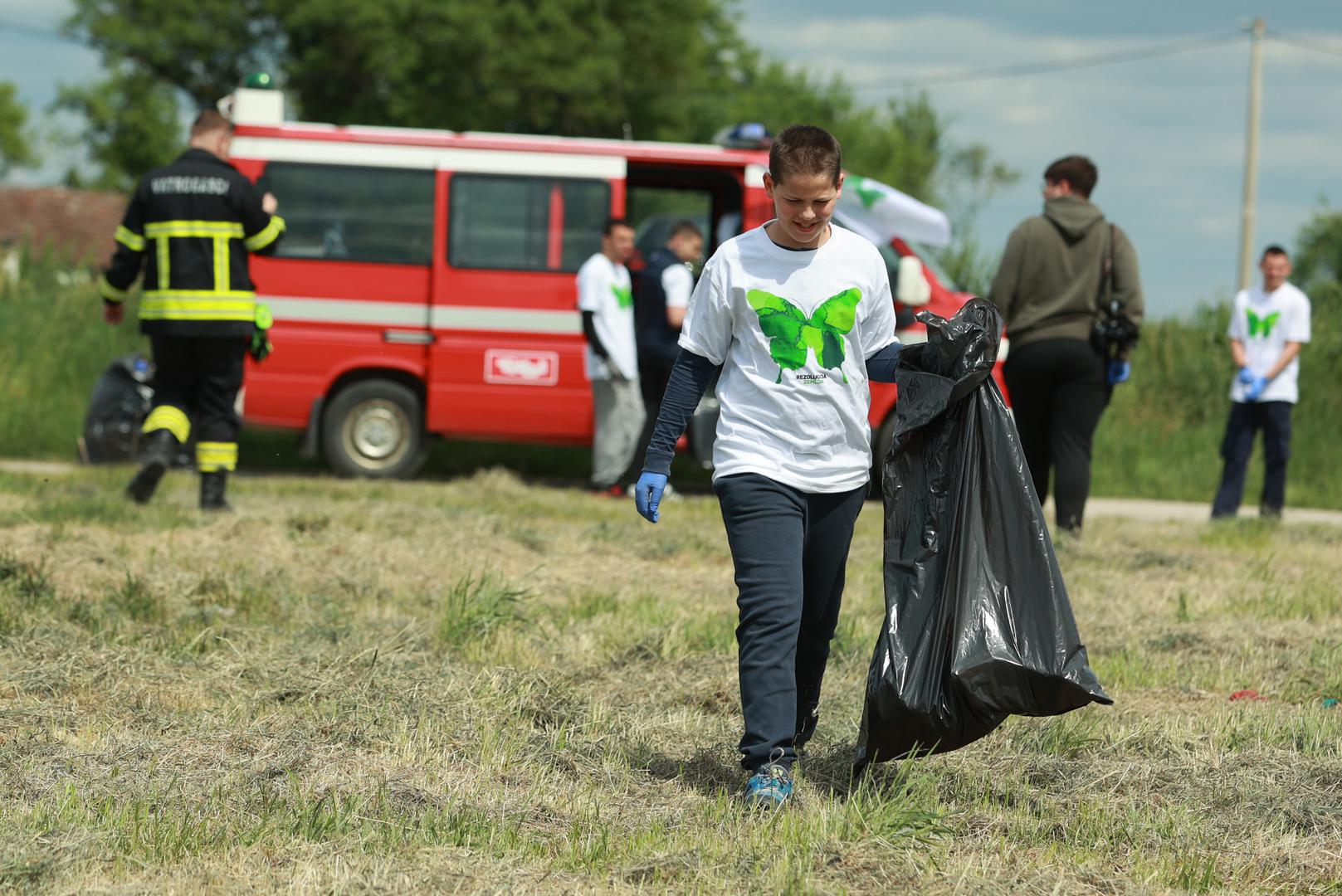PRI KORISTENJU FOTOTGRAFIJE ZASTITITI IDENTITET DJETETA! (PREKRITI OCI). 21.04.2024., Bosnjaci - Rezolucija Zemlja akcija ciscenja Savjet mladih Opcine Bosnjaci. Photo: Davor Javorovic/PIXSELL