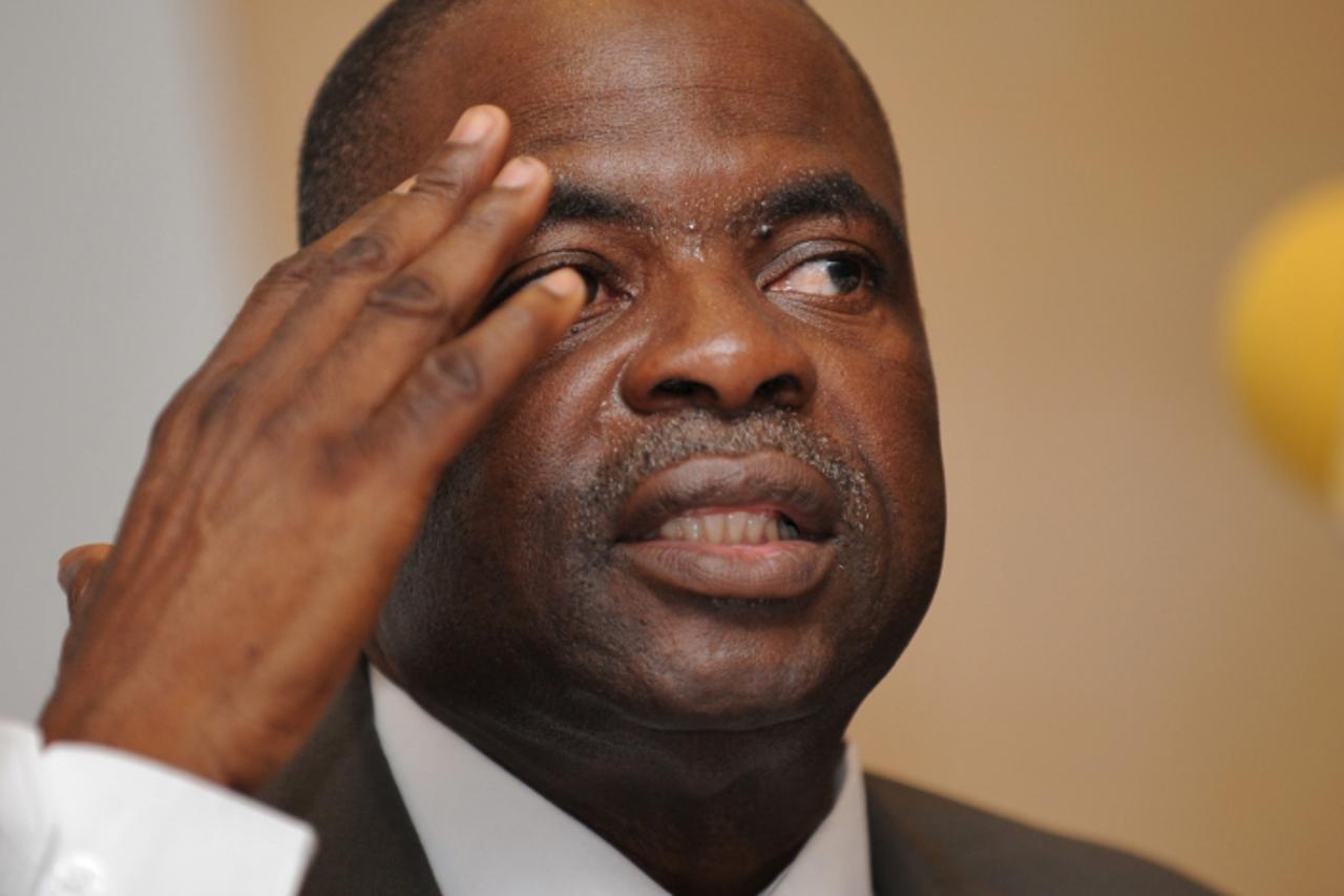\'(FILES) Photo dated on April 22, 2008 shows newly elected executive committee of the West African Football Union (WAFU), Nigerian Amos Adamu,  at the end of a general assembly  in Abidjan. FIFA on N