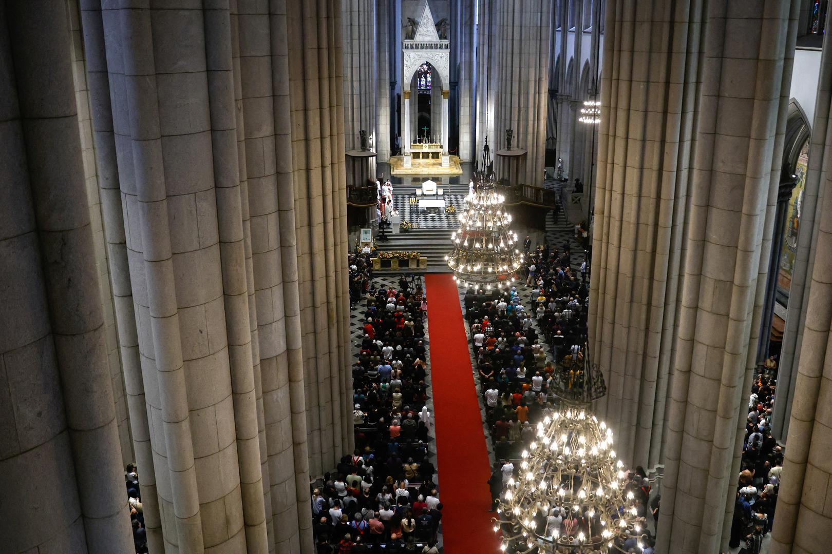 People pay tribute to Pope Francis in the Cathedral of Se, after his death was announced by the Vatican, in Sao Paulo, Brazil, April 21, 2025. REUTERS/Tuane Fernandes Photo: Tuane Fernandes/REUTERS