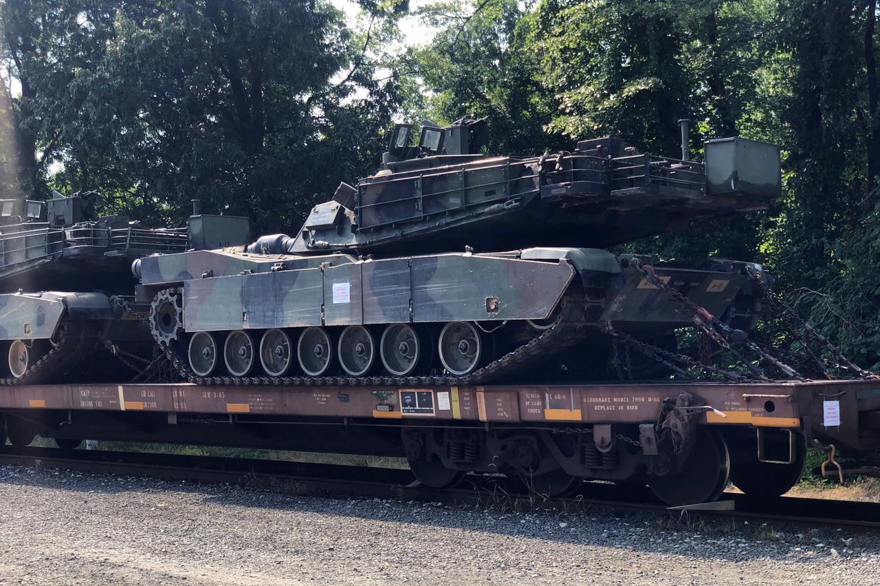 FILE PHOTO: An M1 Abrams tank sits atop a flat car in a rail yard in Southeast Washington
