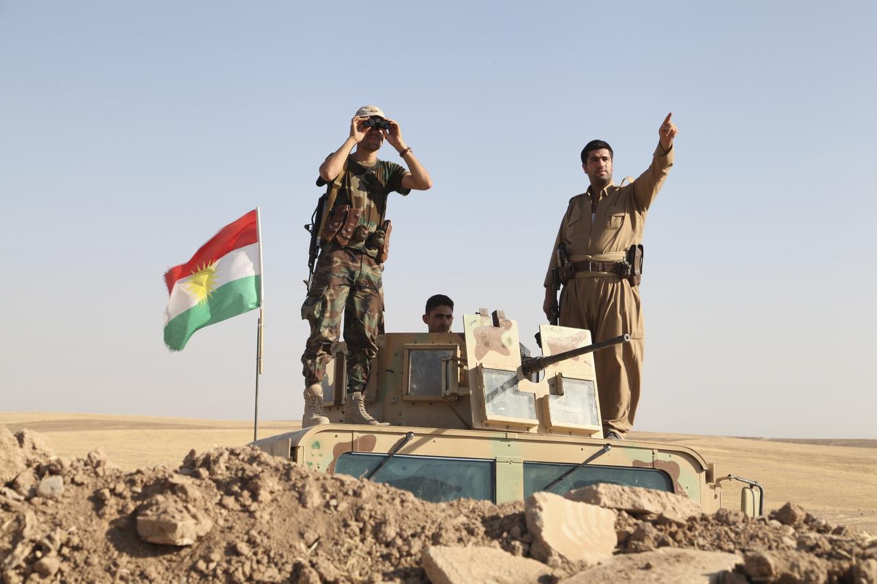 Kurdish peshmerga troops participate in an intensive security deployment against Islamic State militants on the front line in Khazer August 8, 2014. U.S. warplanes bombed Islamist fighters marching on Iraq's Kurdish capital on Friday after President Barac