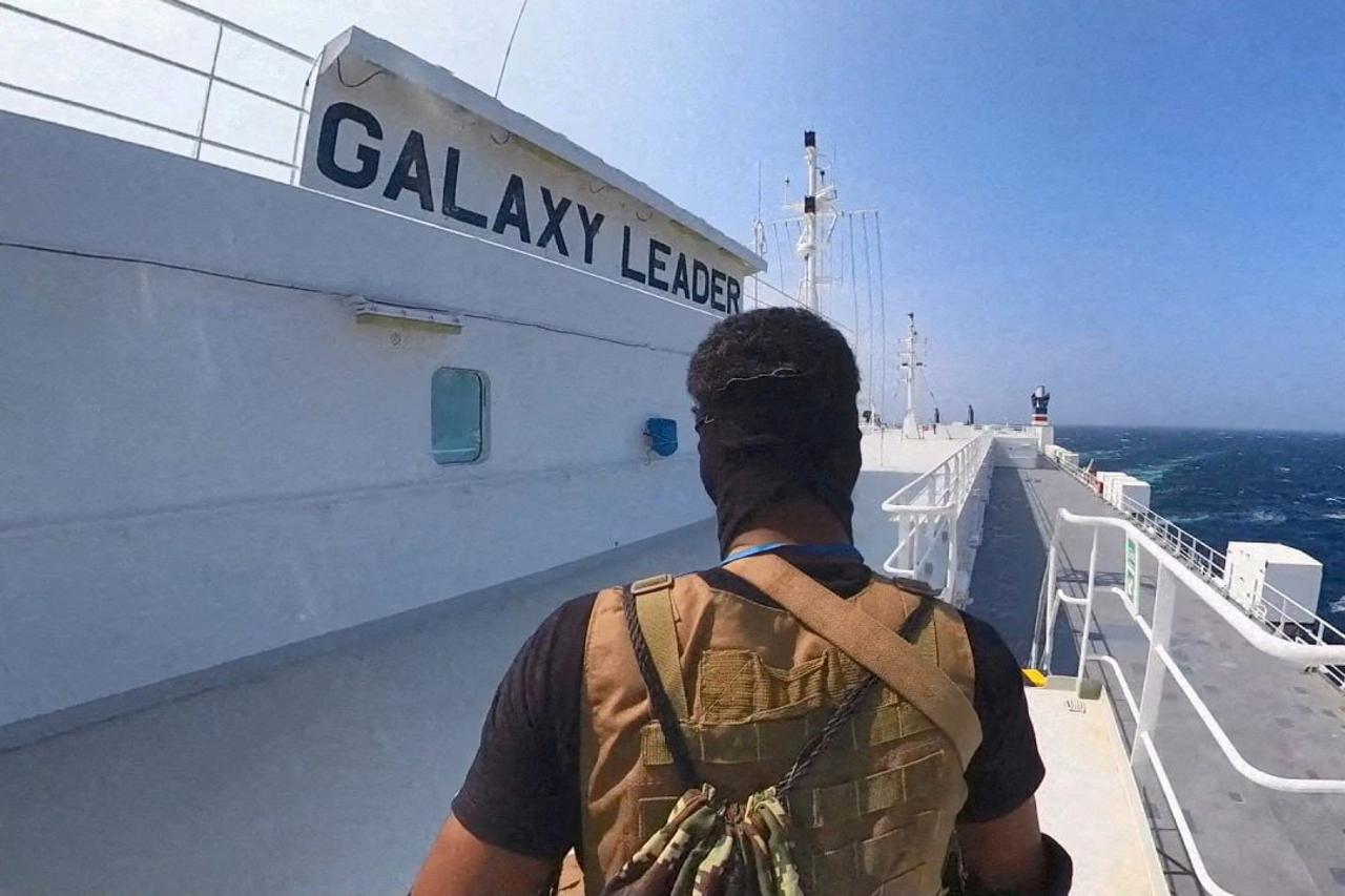 FILE PHOTO: Houthi fighter stands on the Galaxy Leader cargo ship in the Red Sea
