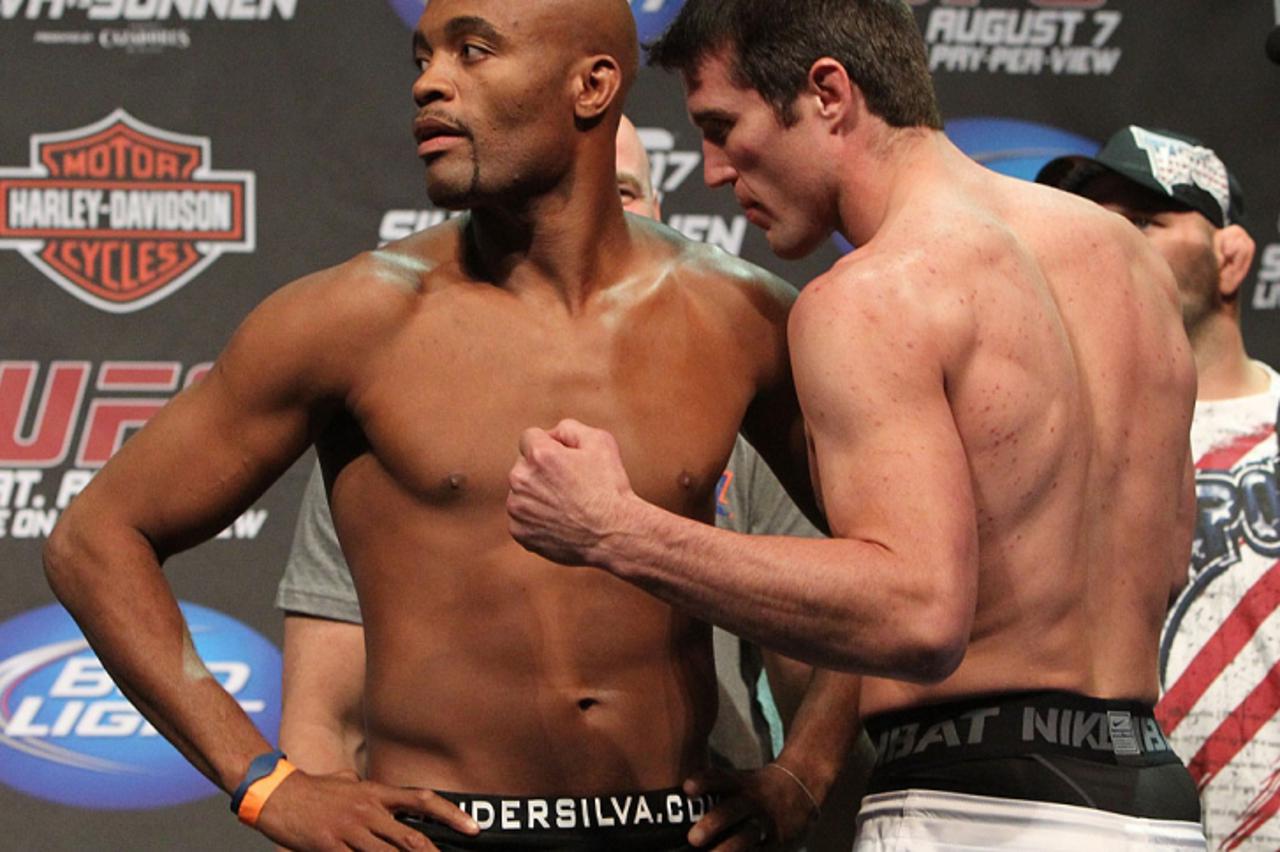 'OAKLAND, CA - AUGUST 06:  (L-R) UFC Middleweight Champion Anderson Silva refuses to face off with opponent Chael Sonnen at the UFC 117 weigh-in at Oracle Arena on August 6, 2010 in Oakland, Californi
