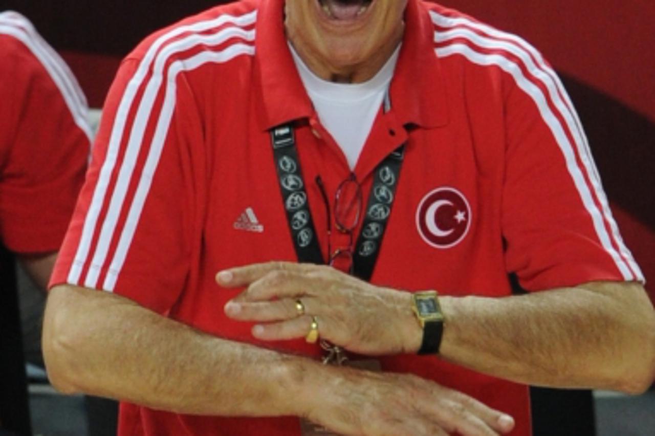 'Turkey\'s head coach Bogdan Tanjevic reacts to play  during a basketball World Cup Championship final match Turkey versus US in Istanbul on September 12, 2010. AFP PHOTO / MUSTAFA OZER'