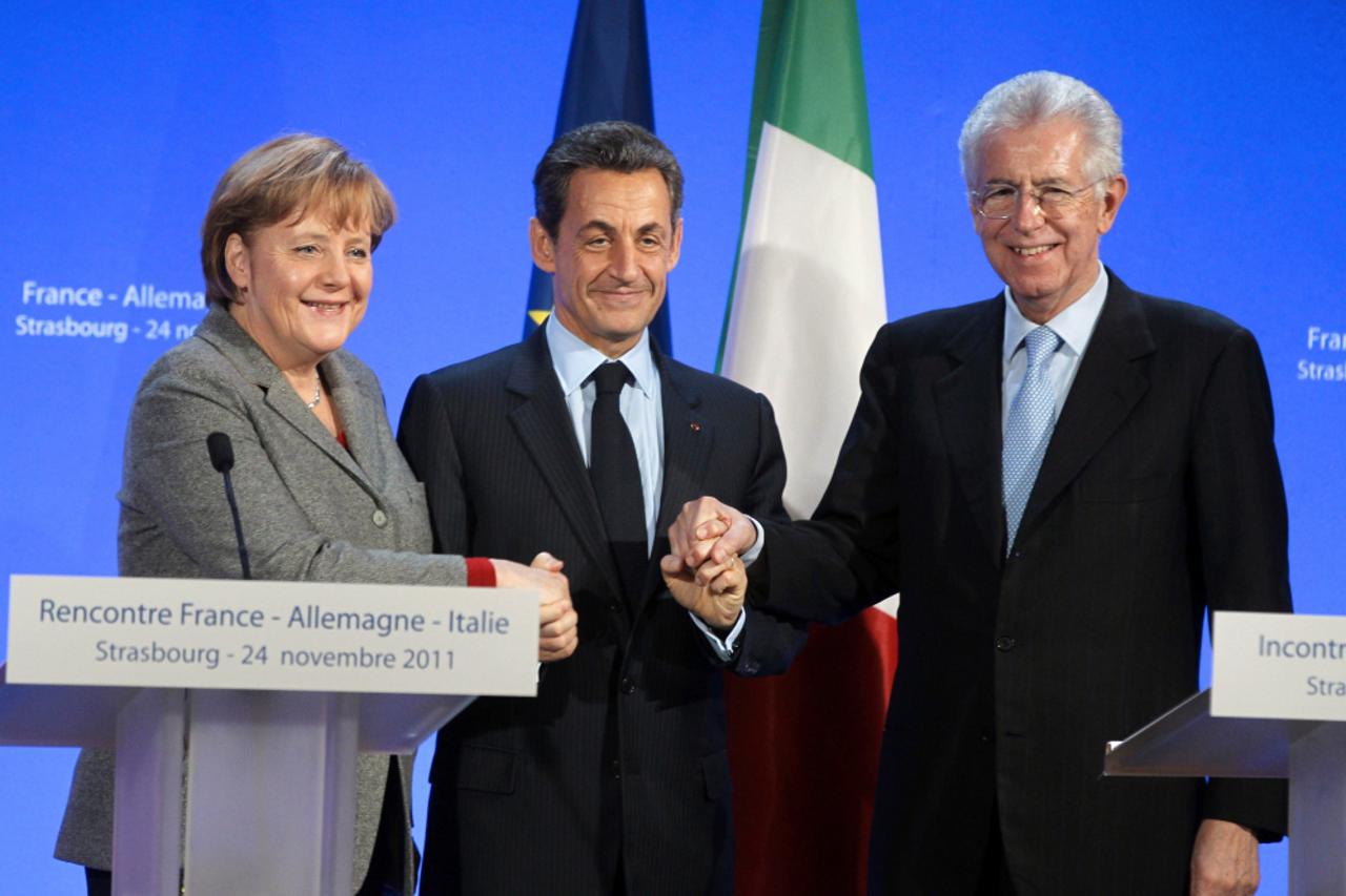 monti, merkel, sarkozy