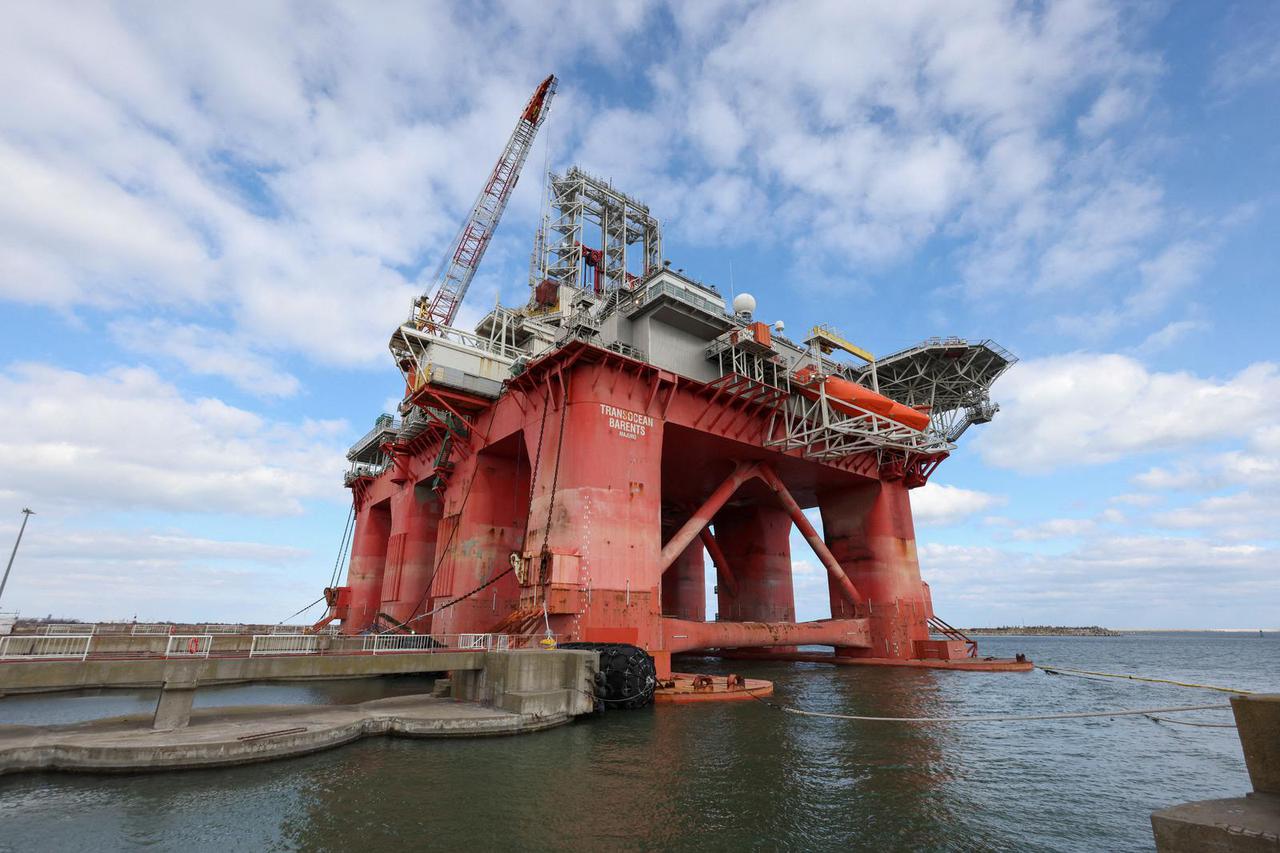FILE PHOTO: Semi-submersible drilling rig Transocean Barents prepares to drill ten gas wells that make Neptun Deep, which will double Romania's production