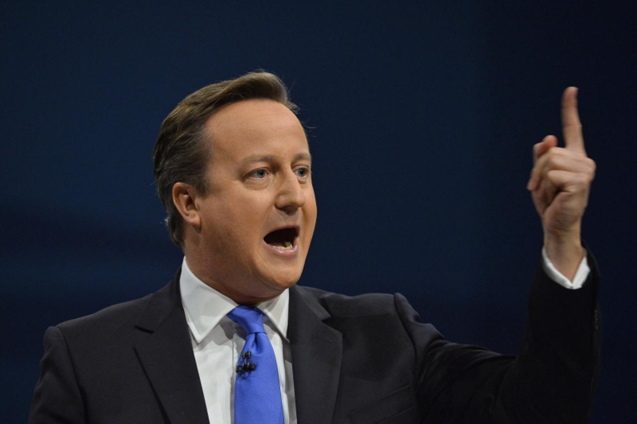 'Britain\'s Prime Minister David Cameron delivers his keynote address to the Conservative Party annual conference in Manchester, northern England October 2, 2013. REUTERS/Toby Melville (BRITAIN - Tags