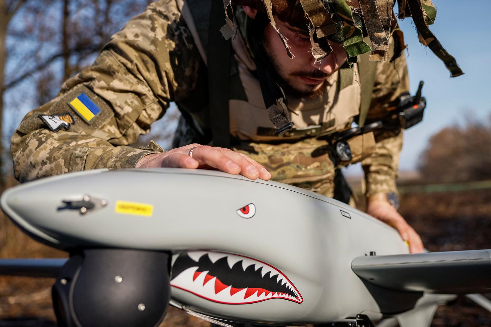 Serviceman of the 15th Separate Artillery Reconnaissance Brigade of the Armed Forces of Ukraine, callsign Buryi, 30-years-old, checks a Shark drone before launching, amid Russia's attack on Ukraine, in Kharkiv region, Ukraine, October 30, 2023. REUTERS/Alina Smutko Photo: ALINA SMUTKO/REUTERS
