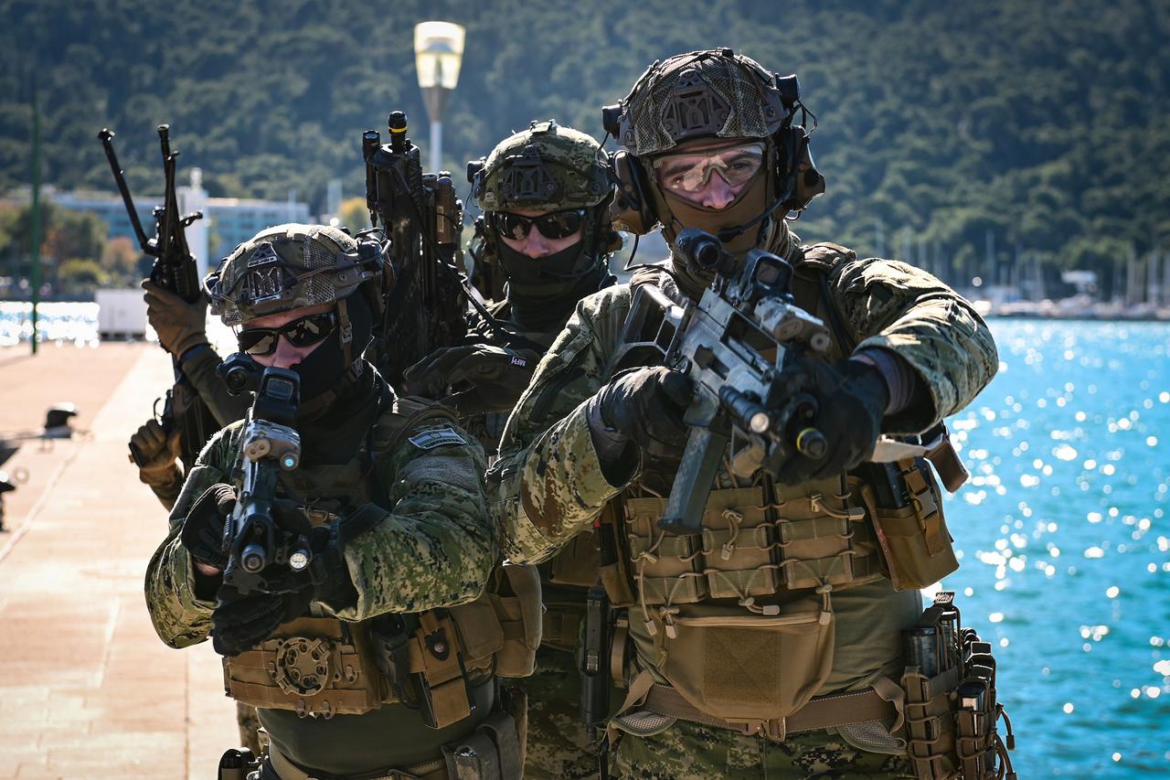A Lebanese army soldier stands guard at the site of an Israeli strike in Beirut