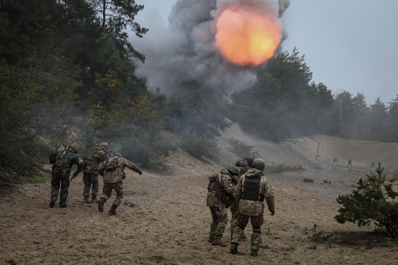 Ukrainian servicemen from the Volyn Territorial Defence brigade attend an exercise near the border with Belarus in Volyn region