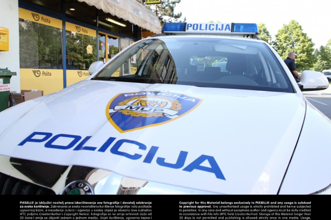 '29.05.2012., Karlovac - Nepoznata muska osoba oko 15:30 hladnim oruzjem izvrsila je razbojnistvo poste u karlovackom naselju Grabrik. Photo: Kristina Stedul Fabac/PIXSELL'