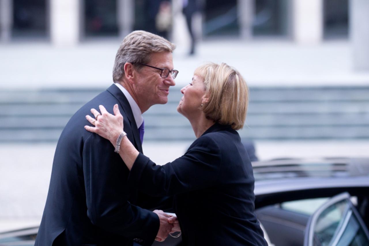 'German Federal Foreign Minister Guido Westerwelle says goodbye to his Croatian counterpart Vesna Pusic after a meeting in Berlin, Germany, 15 June 2012. At the center of talks was the current develop