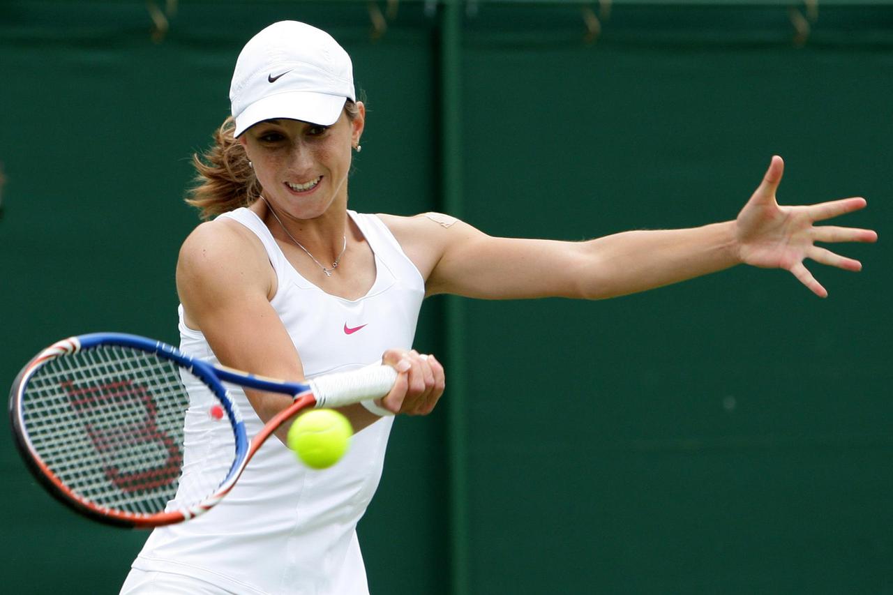 Croatia's Petra Martic in action against Great Britain's Elena Baltacha during Day One of the 2010 Wimbledon Championships at the All England Lawn Tennis Club, Wimbledon.  Photo: Press Association/PIXSELL