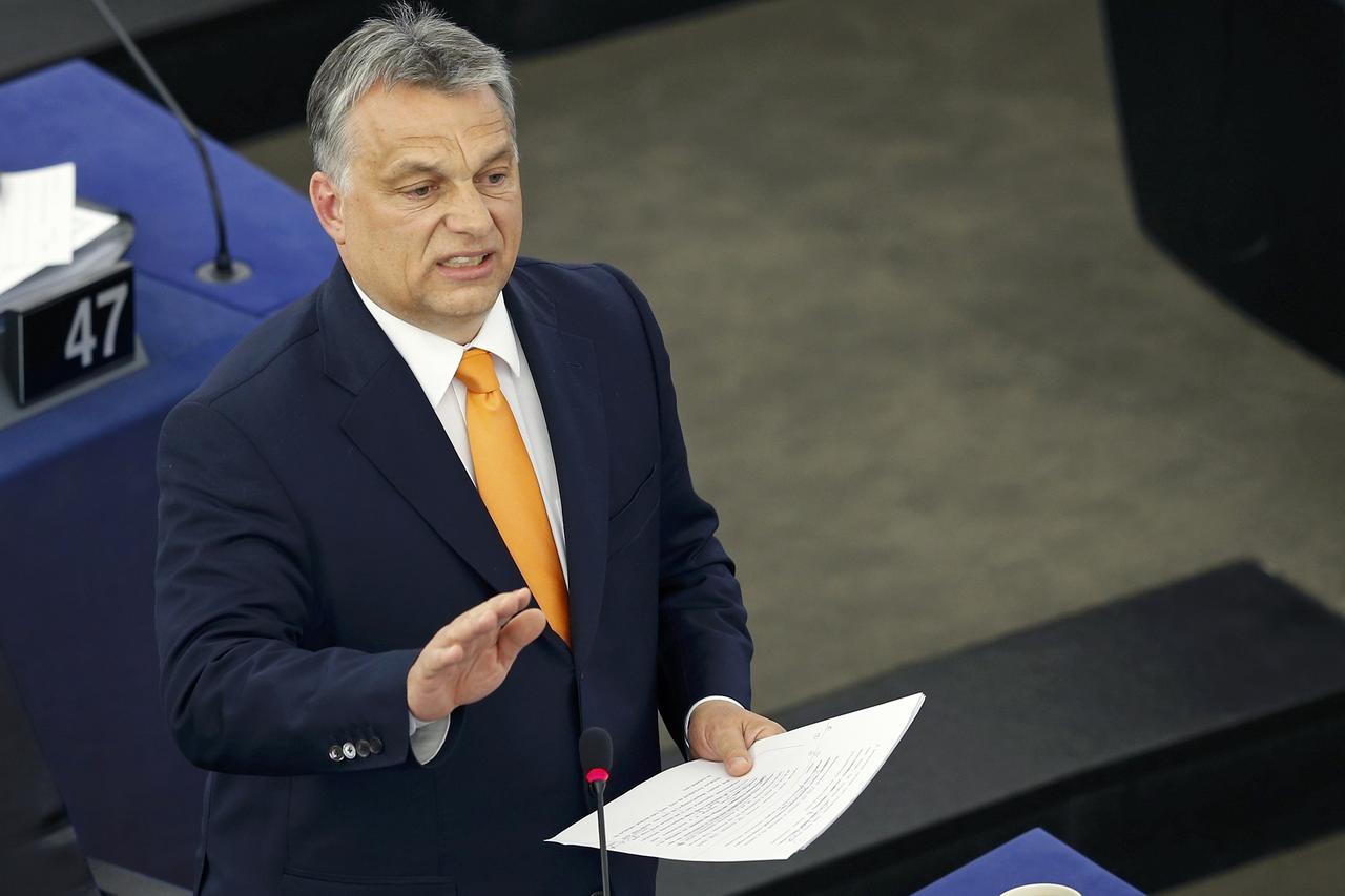 Hungarian Prime Minister Viktor Orban delivers a speech during a debate on the situation in Hungary at the European Parliament in Strasbourg, France, May 19, 2015.  REUTERS/Vincent Kessler