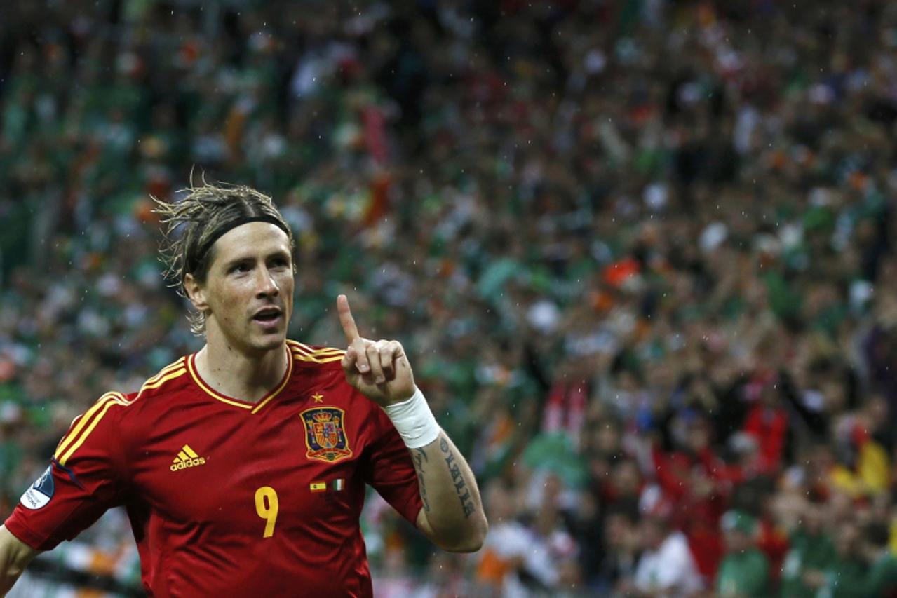 'Spain\'s Fernando Torres celebrates after scoring a goal against Ireland during their Group C Euro 2012 soccer match at PGE Arena in Gdansk June 14, 2012.                   REUTERS/Pascal Lauener (PO