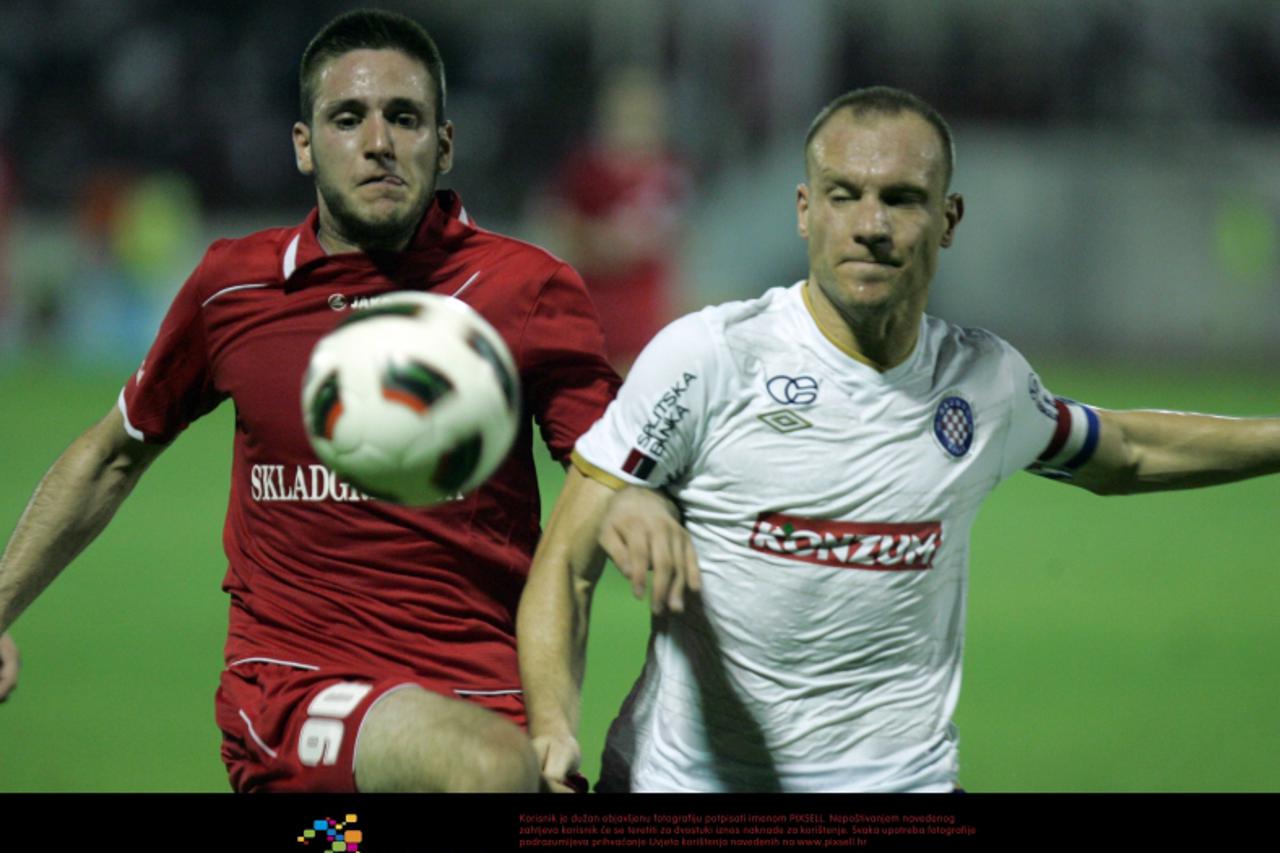 '28.08.2011., Park mladezi, Split - 1. HNL, 6. kolo, RNK Split - Hajduk Split. Duje Cop i Srdjan Andric u borbi za loptu.  Photo: Ivo Cagalj/PIXSELL'