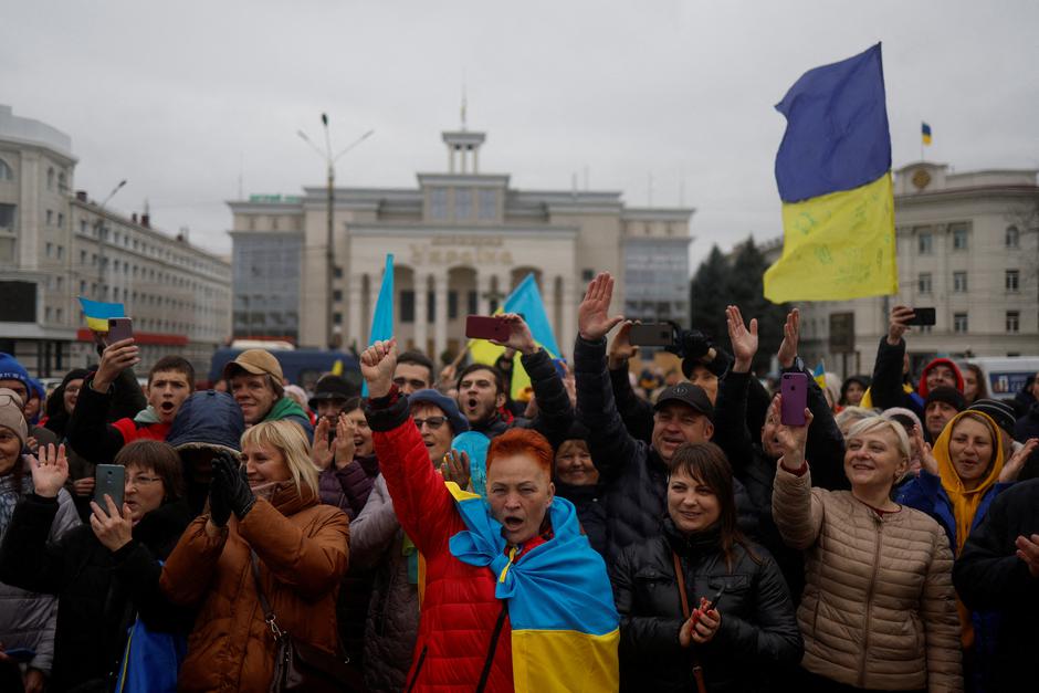Local residents celebrate after Russia's retreat from Kherson, in central Kherson