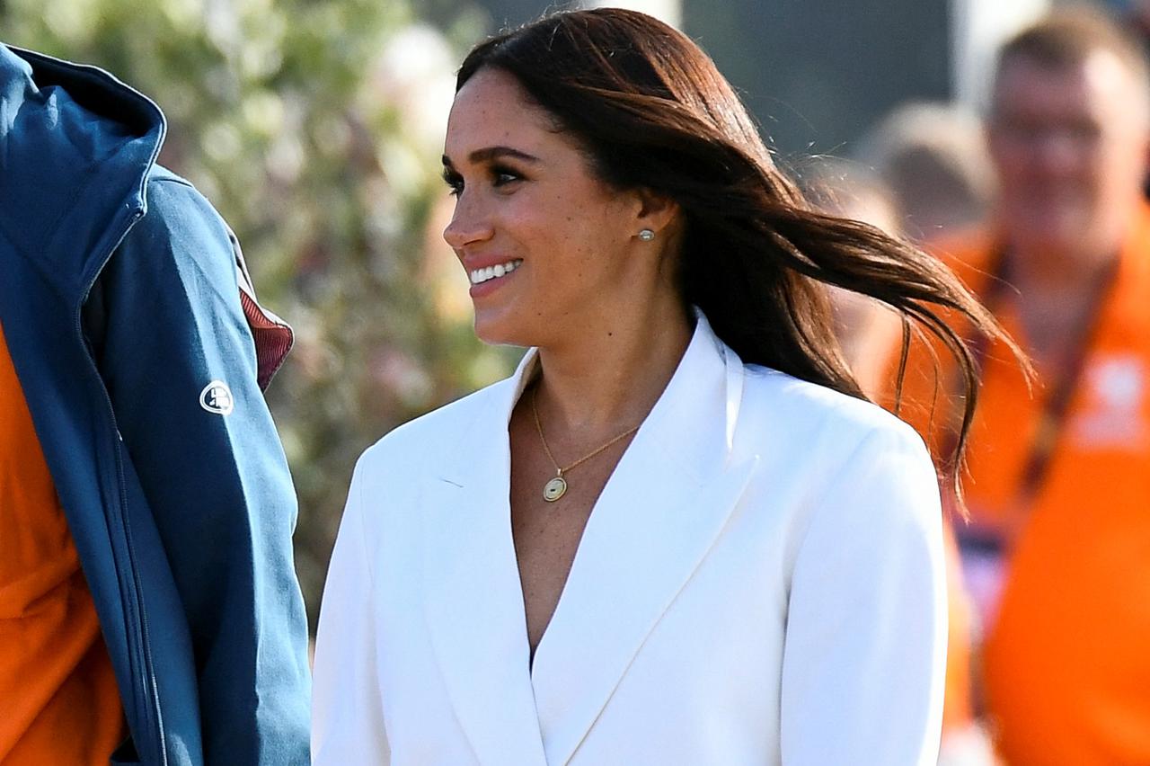 Britain's Prince Harry and Meghan, Duchess of Sussex, attend the yellow carpet of the Invictus Games in The Hague