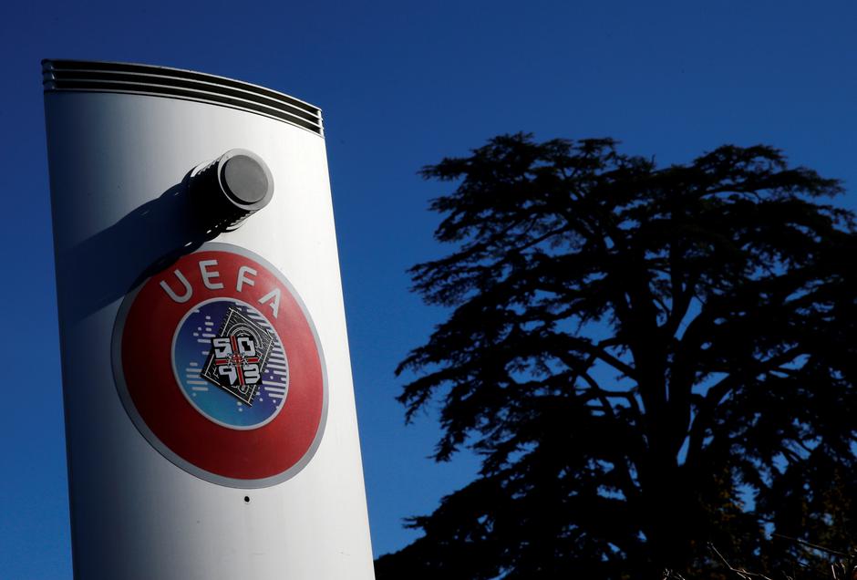 FILE PHOTO: A logo is pictured outside the UEFA in Nyon