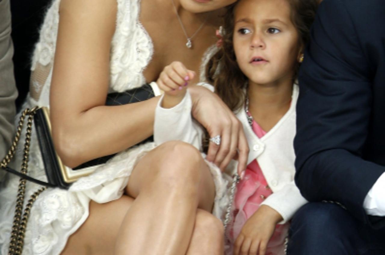 'Actress and singer Jennifer Lopez (L) and her daughter Emme attend the Spring/Summer 2013 women\'s ready-to-wear fashion show by German designer Karl Lagerfeld for French fashion house Chanel during 