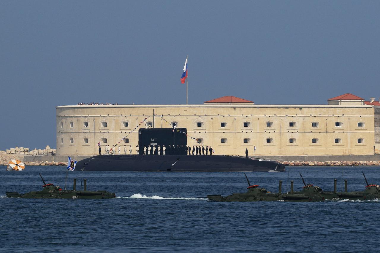 FILE PHOTO: Russian sailors line up on board the diesel-electric submarine "Novorossiysk" during the Navy Day parade in Sevastopol
