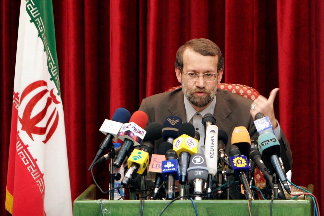 FILE PHOTO: Iran's top nuclear negotiator Larijani speaks to journalists in Tehran.