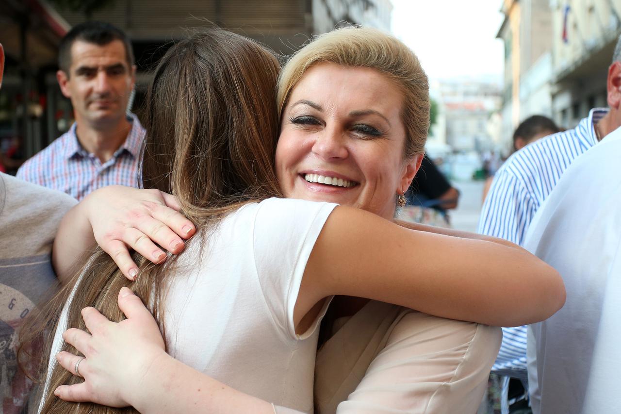 13.08.2015., Split - Predsjednica Republike Hrvatske Kolinda Grabar-Kitarovic prosetala je gradom i obisla obrtnike u staroj gradskoj jezgri.  Photo: Sanjin Strukic/PIXSELL