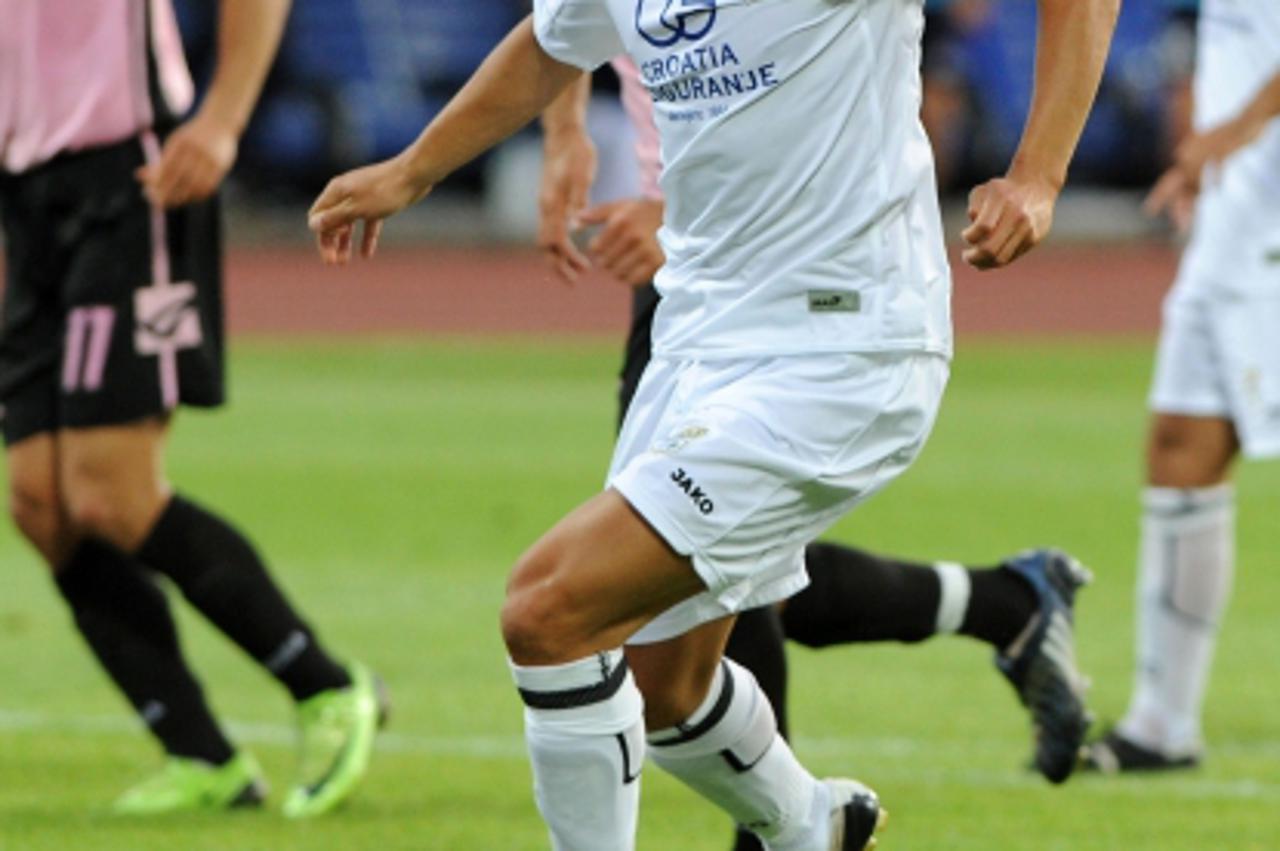 '26.07.09.Rijeka -Odigrana je nogometna utakmica 1.kola 1. hrvatske nogometne lige izmedju NK Rijeke i NK Lokomotive, Anas Sharbini u akciji za 2:0  Photo: Danilo Pavletic/24sata'