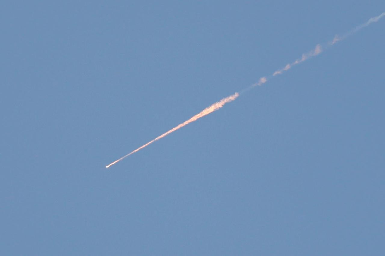 A projectile launched from Iran heads towards Israel, amid the U.S.-Israeli conflict with Iran, as seen from Ramallah