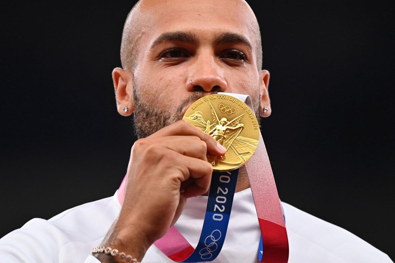 FILE PHOTO: Athletics - Men's 100m - Medal Ceremony