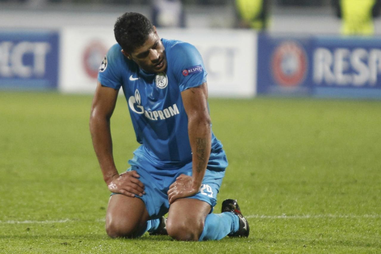 'Zenit St. Petersburg\'s Hulk (L) reacts during his Champion\'s league Group C soccer match against AC Milan in St. Petersburg\'s Petrovsky Stadium October 3, 2012.   REUTERS/Alexander Demianchuk (RUS