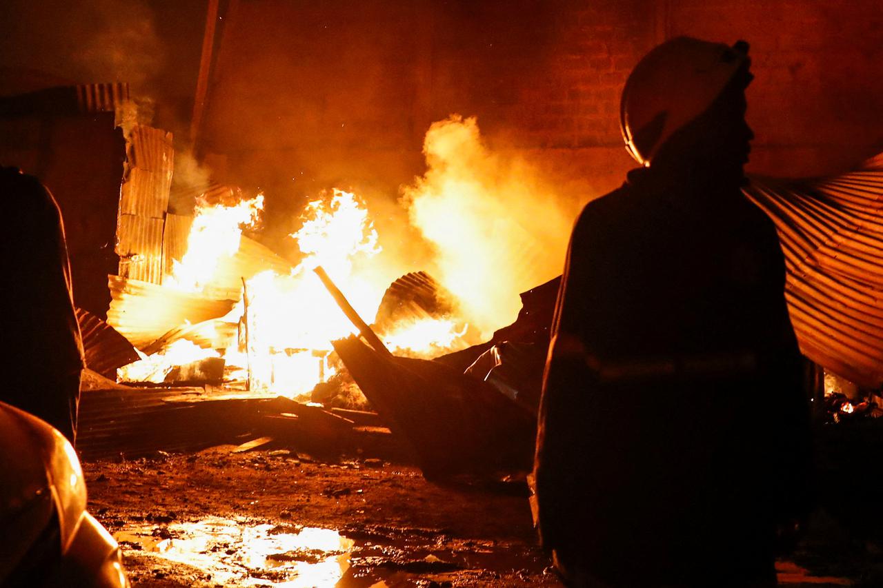 Fire following an explosion at a makeshift gas cylinder refilling depot at Mradi estate in Embakasi district of Nairobi