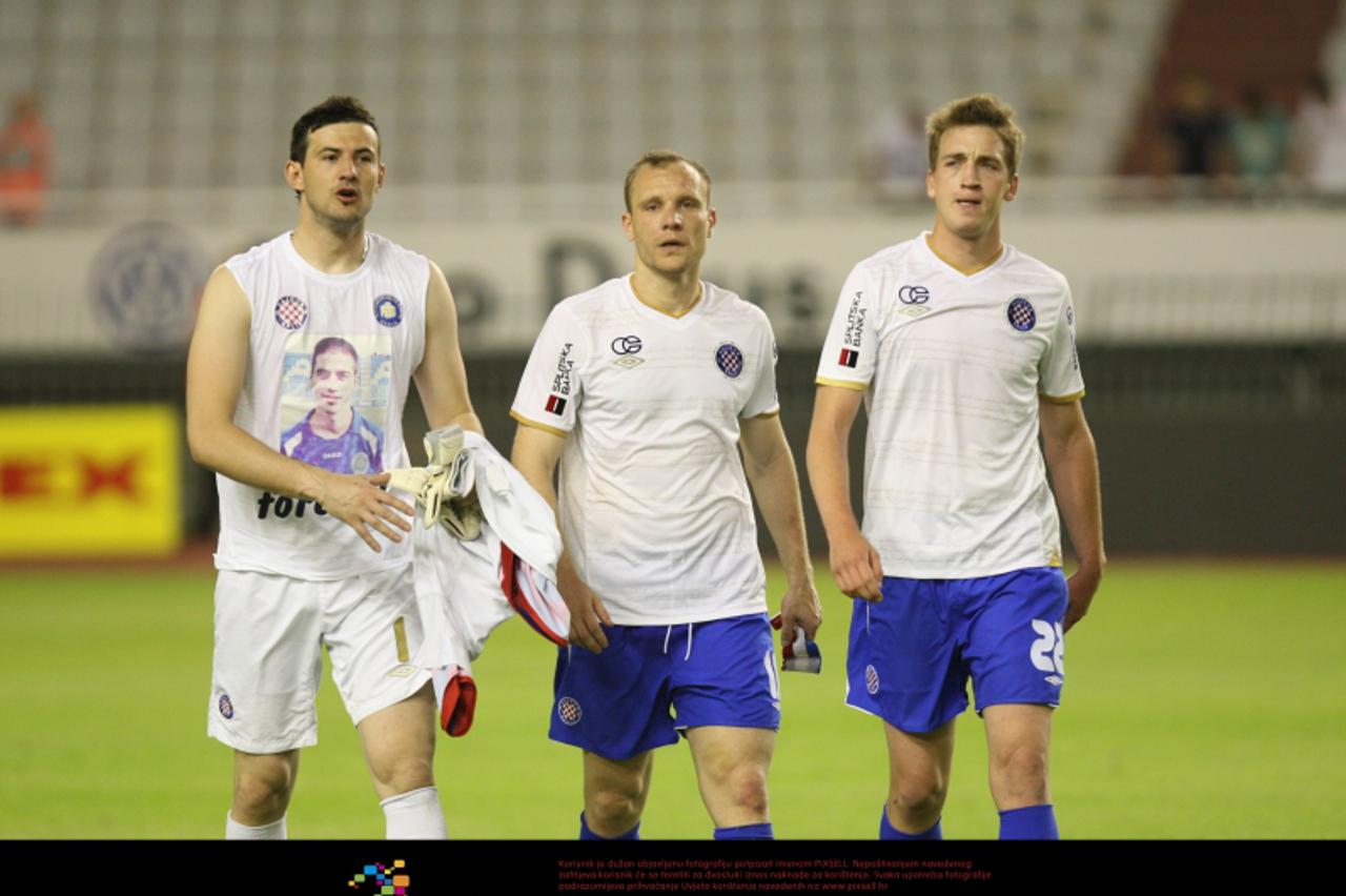 '21.05.2011., Poljud, Split - Nogometna utakmica Prve HNL, 30. kolo, NK Hajduk - NK Lokomotiva.Igraci na kraju utakmice,Subasic sa fotografijom Custica na majici,Andric i Maloca. Photo: Ivo Cagalj/PIX