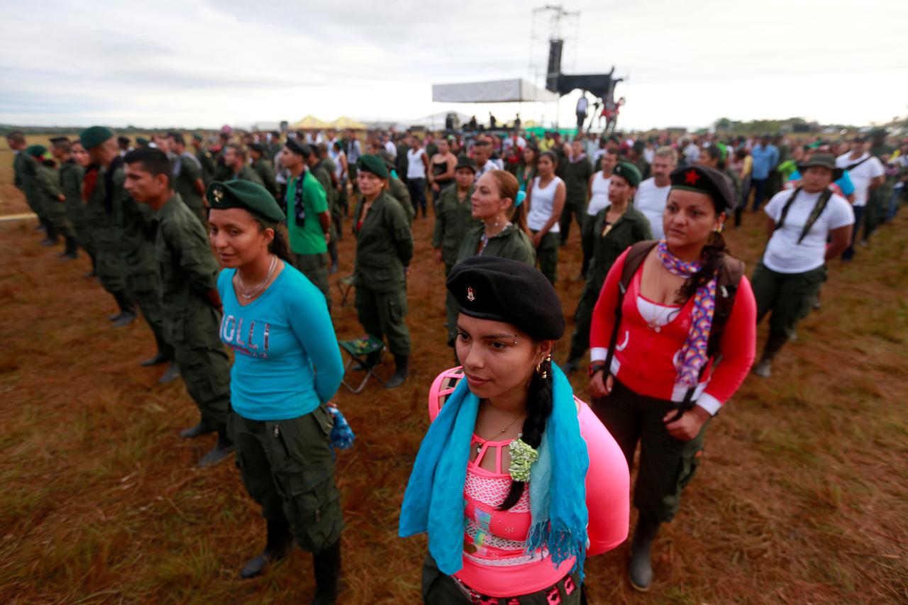 Fighters from Revolutionary Armed Forces of Colombia (FARC),stand in line during the opening of ceremony congress at the camp where they prepare for ratifying a peace deal with the government, near El Diamante in Yari Plains, Colombia, September 17, 2016.