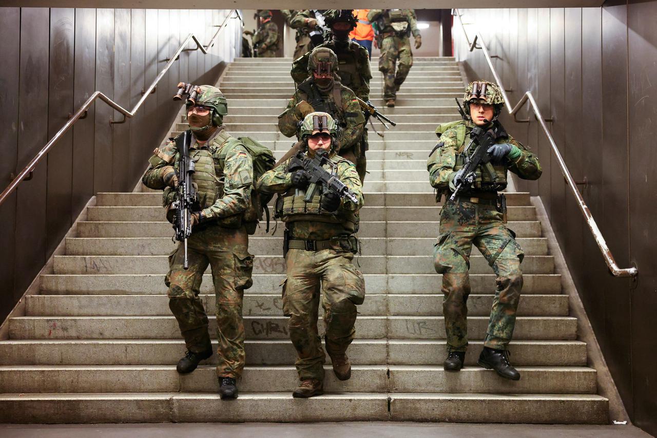Urban warfare training at night by German army Bundeswehr at Berlin's Jungfernheide metro station